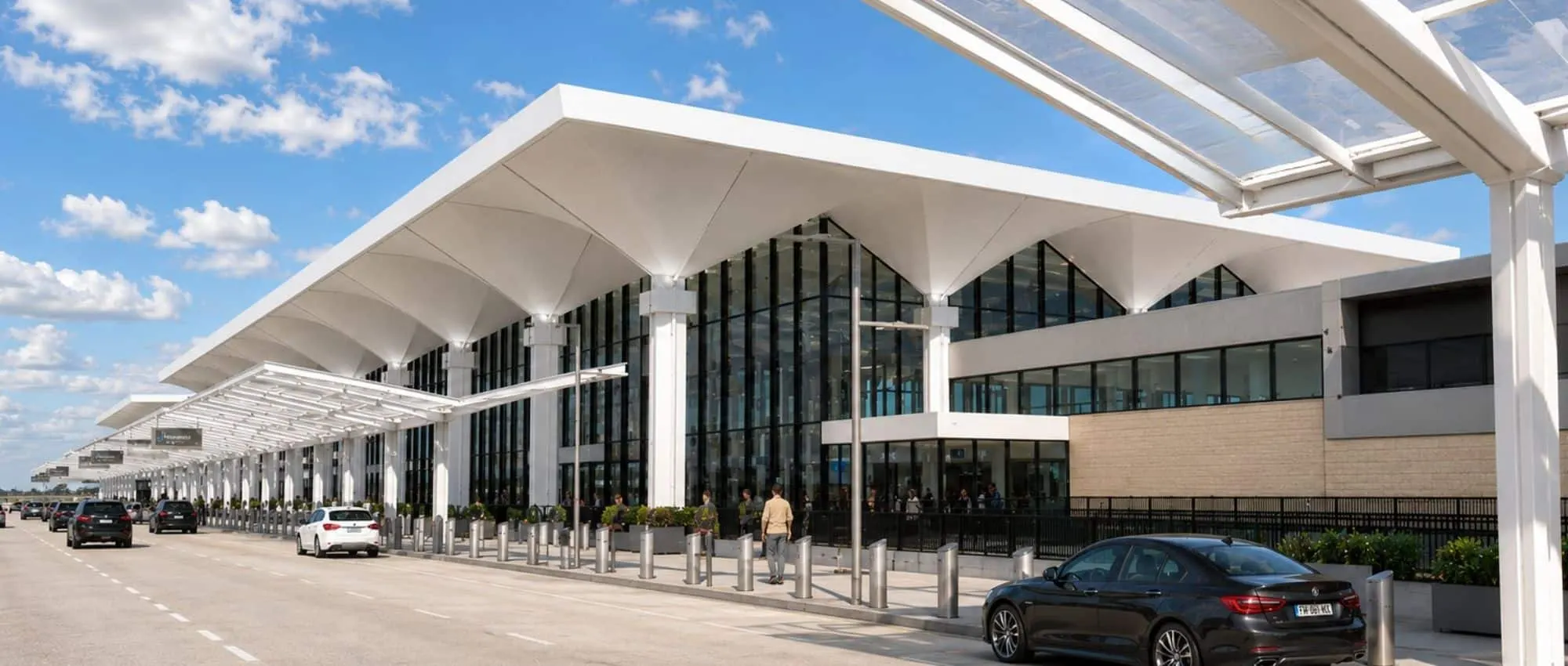 Rendering of the new terminal curbside under its folded canopy