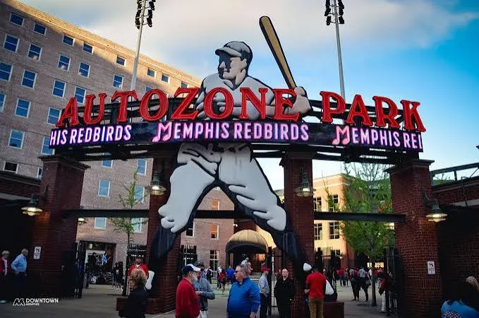 The AutoZone Park gate and its batter statue