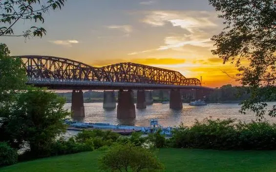 The Harahan Bridge at sunset, seen from the Memphis riverbank