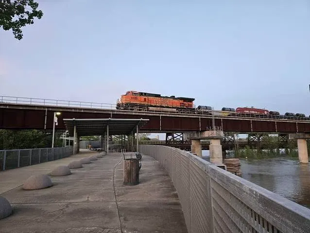 A freight train passing the overlook at the Arkansas end