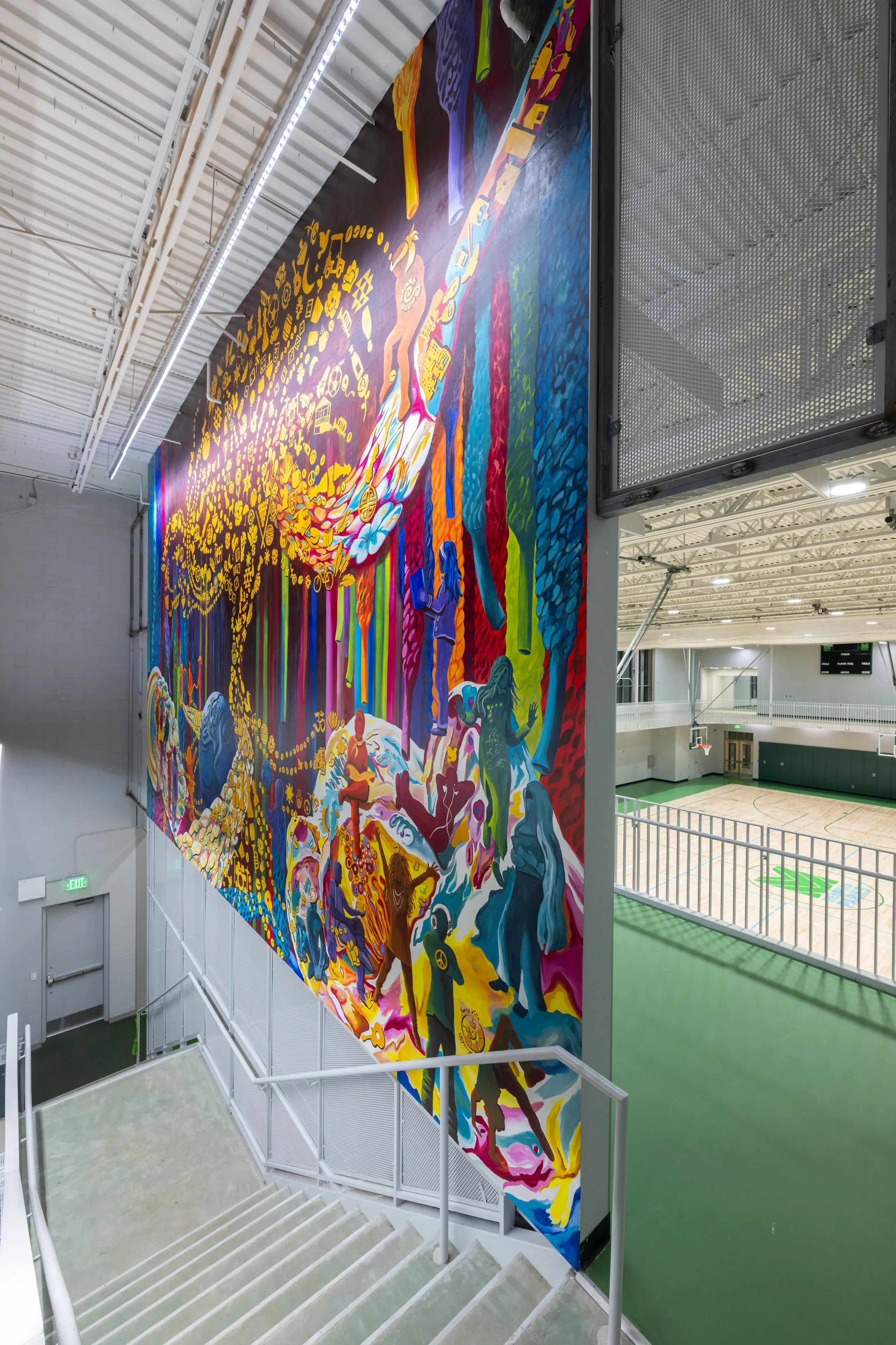 A vivid mural beside the gymnasium's viewing window