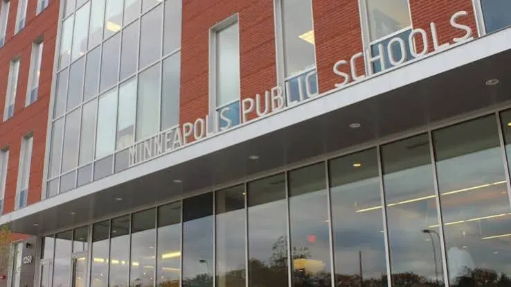 The Minneapolis Public Schools name over a glazed entrance