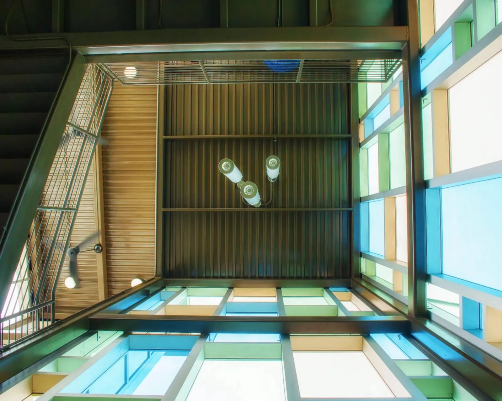 Looking up through the stair tower to the glass above