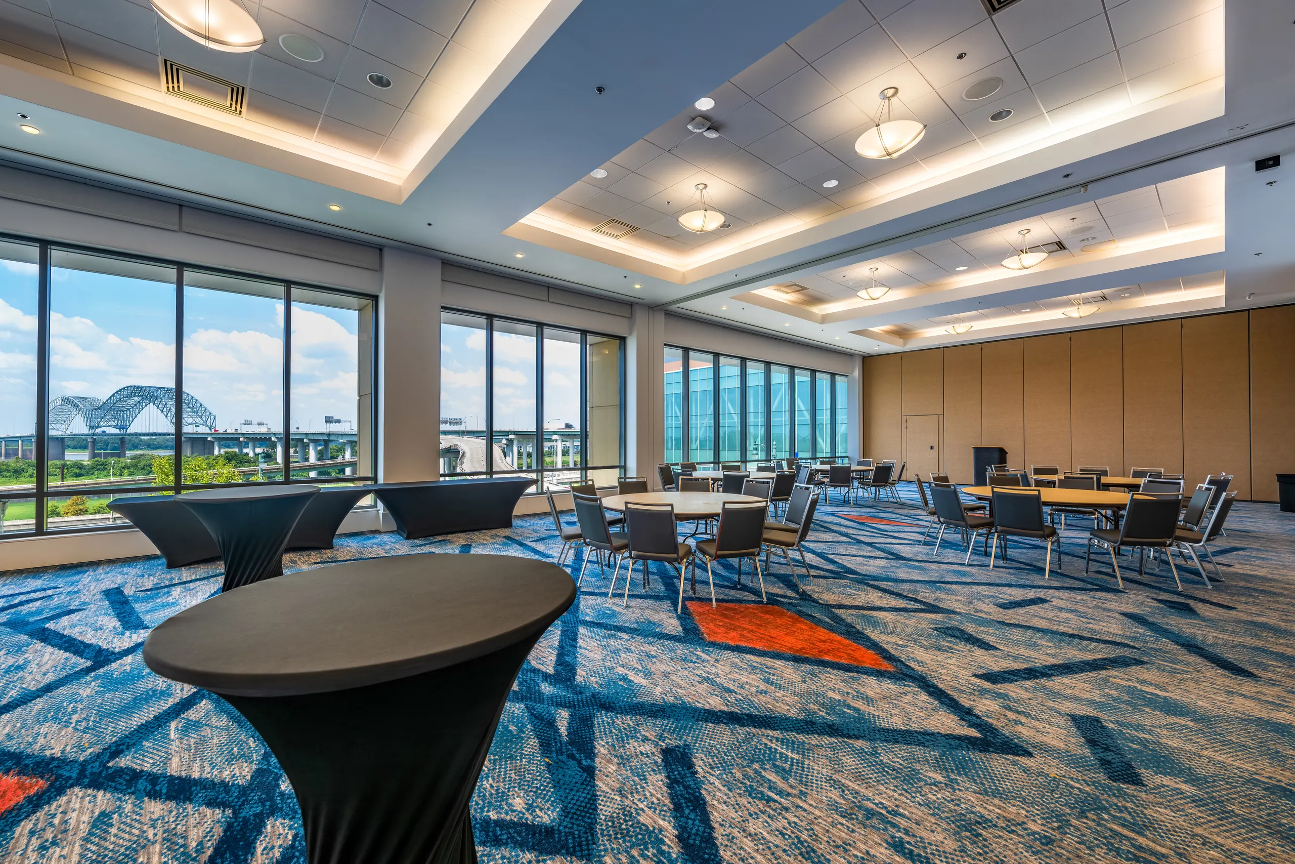 A meeting room with river and bridge views