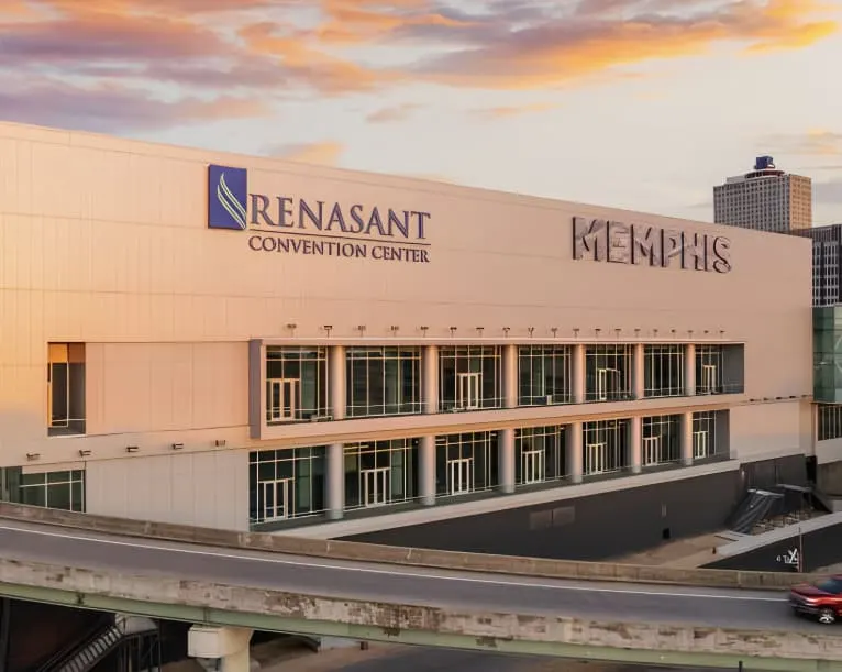 The convention center facade at sunset