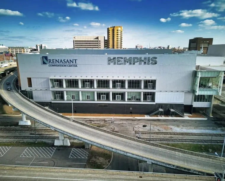 The facade above the curving highway ramp