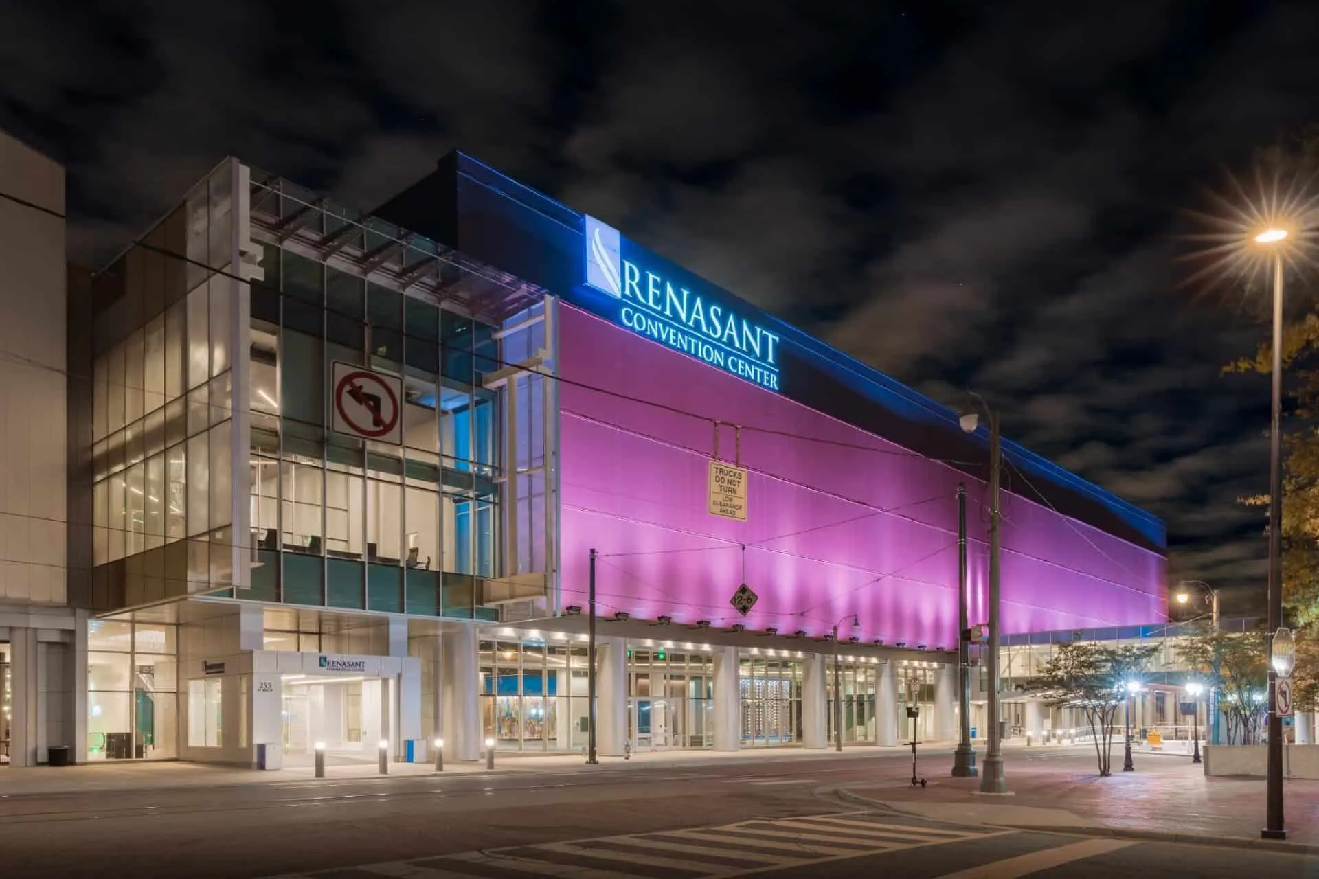 The center lit purple at night from the street