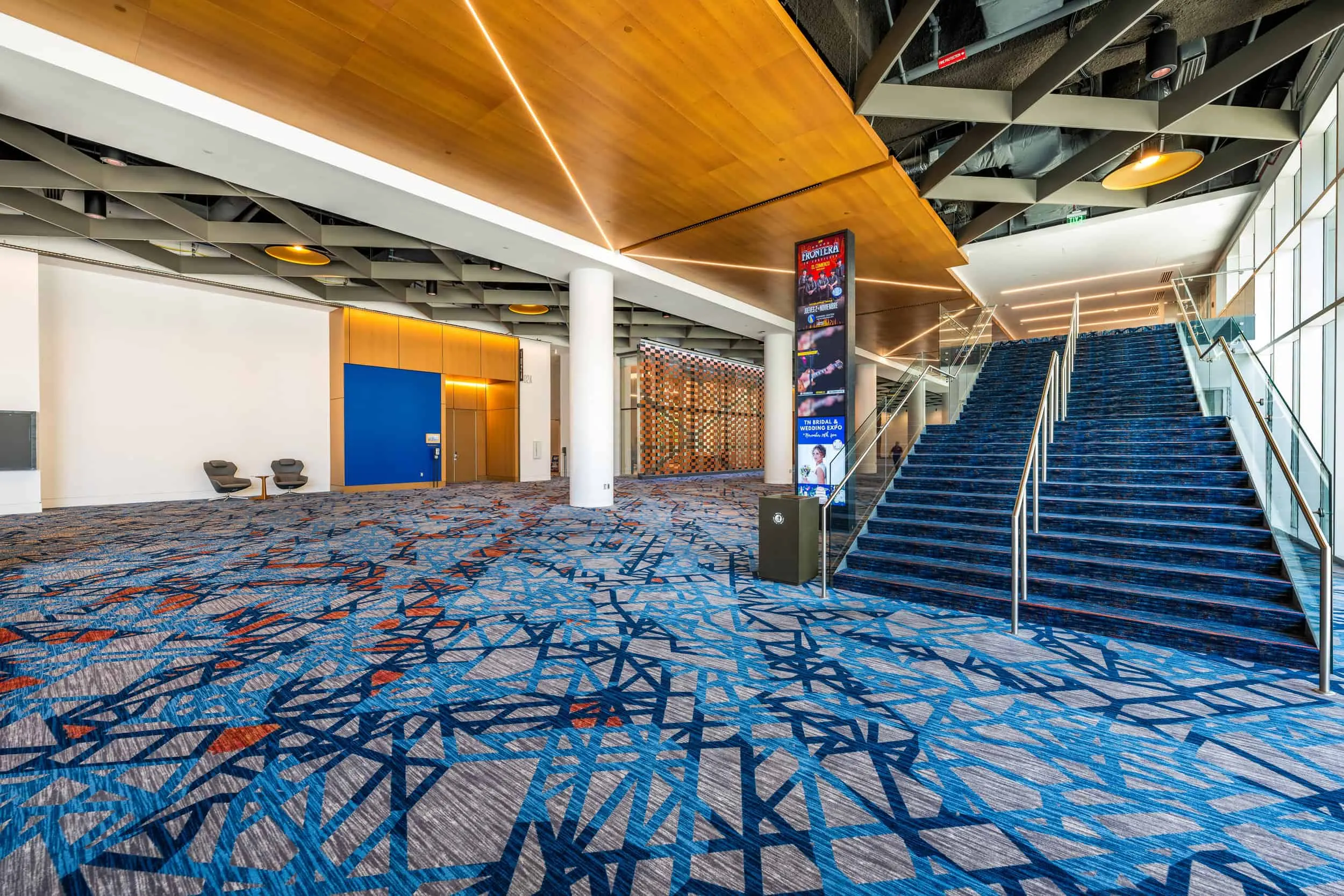 A grand stair beside the concourse